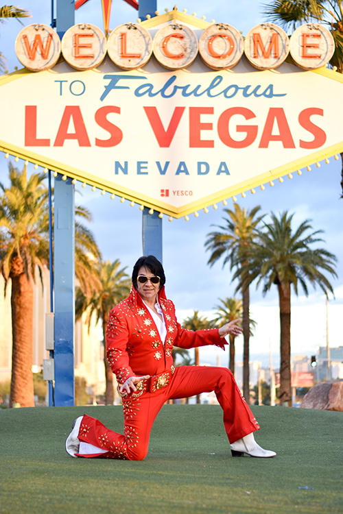 Las Vegas Elvis Impersonator Michael Conti at Las Vegas Sign